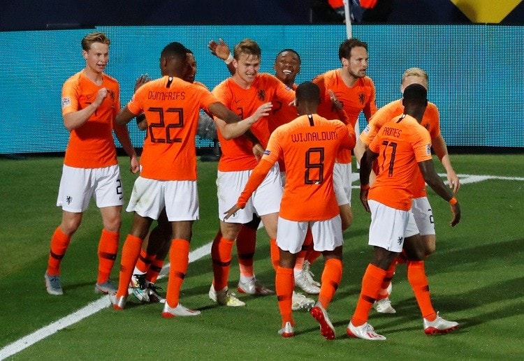 Netherlands celebrate as they earn a 3-1 win against England in the semi-final of the UEFA Nations League