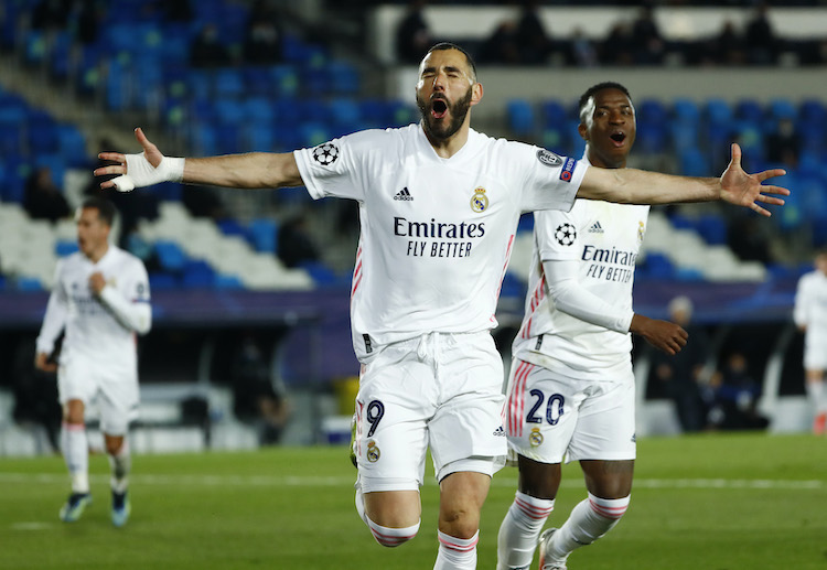 Karim Benzema hits a first-half goal to give Real Madrid an edge against Atalanta in their Champions League clash